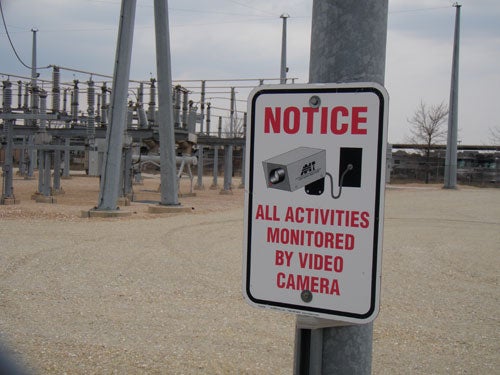 utility surveillance warning sign